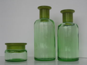 O verde coloriu o vidro do óleo essencial engarrafa 200ML 150ML 50G com redutor & tampão do orifício